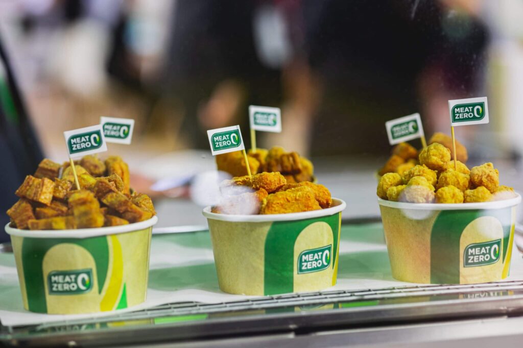 Three cups of plant-based meat samples.