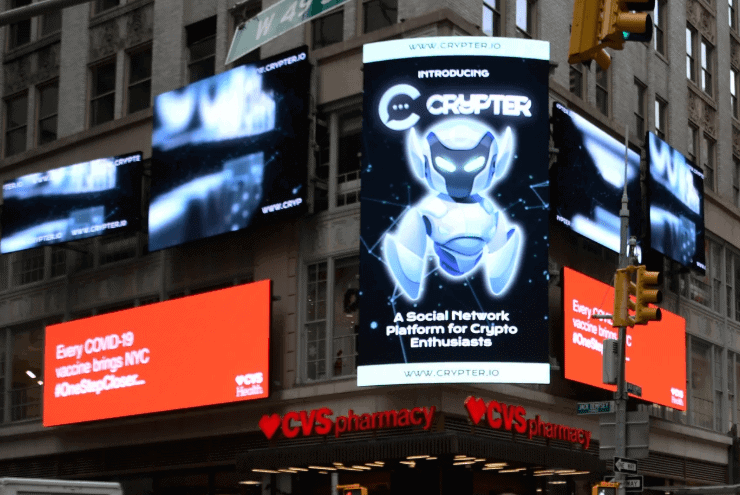 Billboard advertising for Crypter, a social network for crypto enthusiasts, displayed on a prominent urban digital screen, showcasing innovative out-of-home marketing strategies.