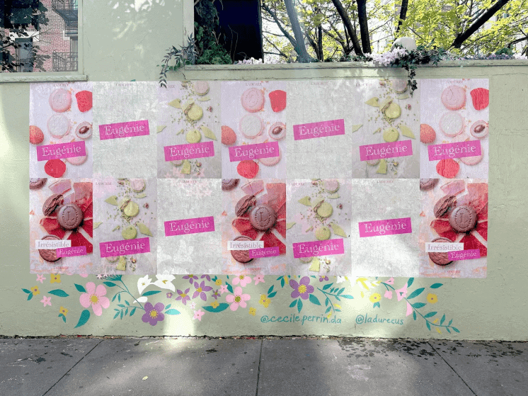 Wheat pasted wall art featuring colorful macaron images and the name "Eugenie," illustrating urban art culture in NYC.