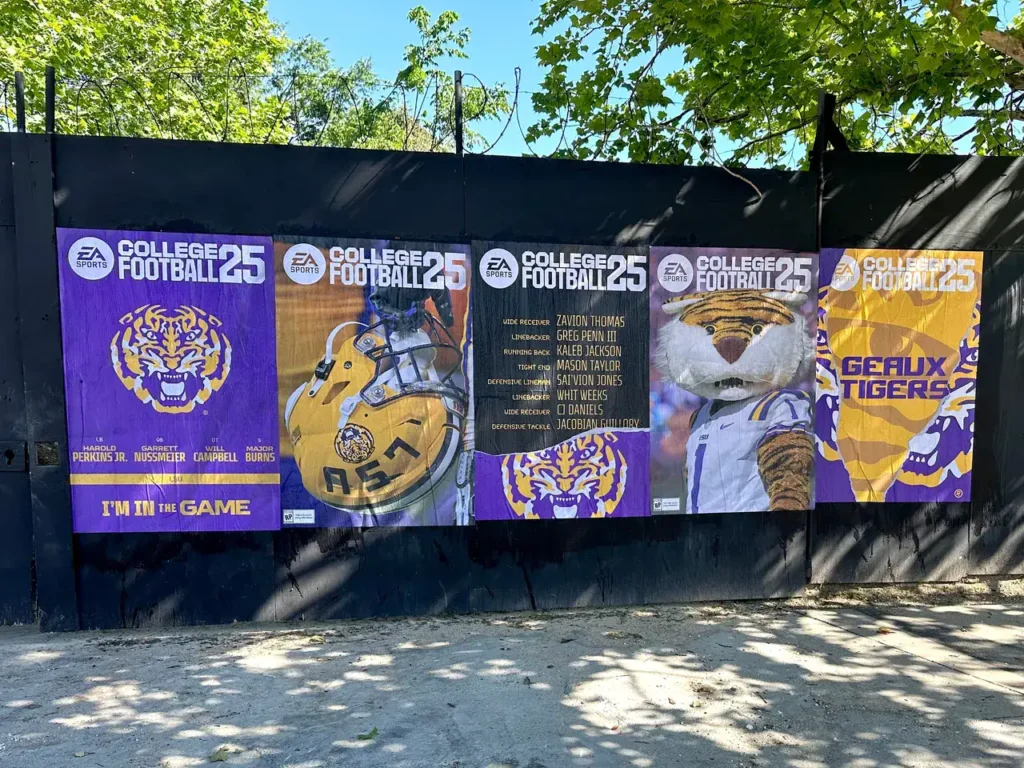 Billboard advertising for EA College Football 25 featuring LSU Tigers mascot and players, promoting guerrilla marketing strategies for maximum impact campaigns.