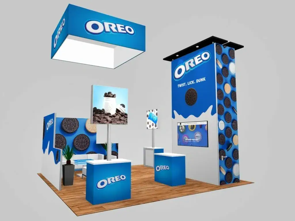Oreo-themed trade show booth design featuring blue branding, interactive displays, and promotional imagery, showcasing creative advertising strategies for conventions and expos.