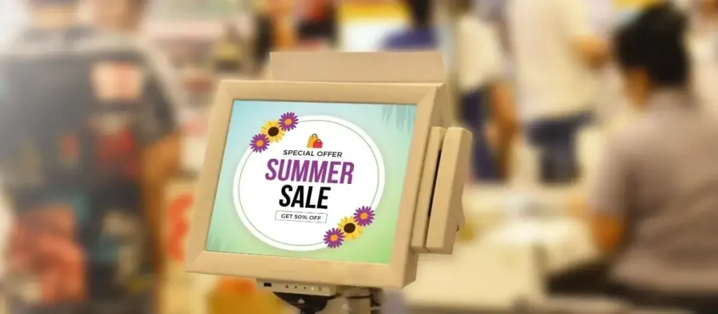 Point of sale display promoting a summer sale with "SPECIAL OFFER" and "GET 50% OFF" text, set in a busy retail environment.