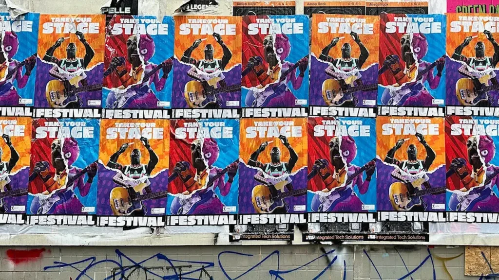 Colorful posters promoting a music festival, featuring bold text "Take Your Stage" and "Festival," with vibrant graphics of musicians playing instruments, reflecting guerrilla marketing tactics for brand visibility in urban settings.