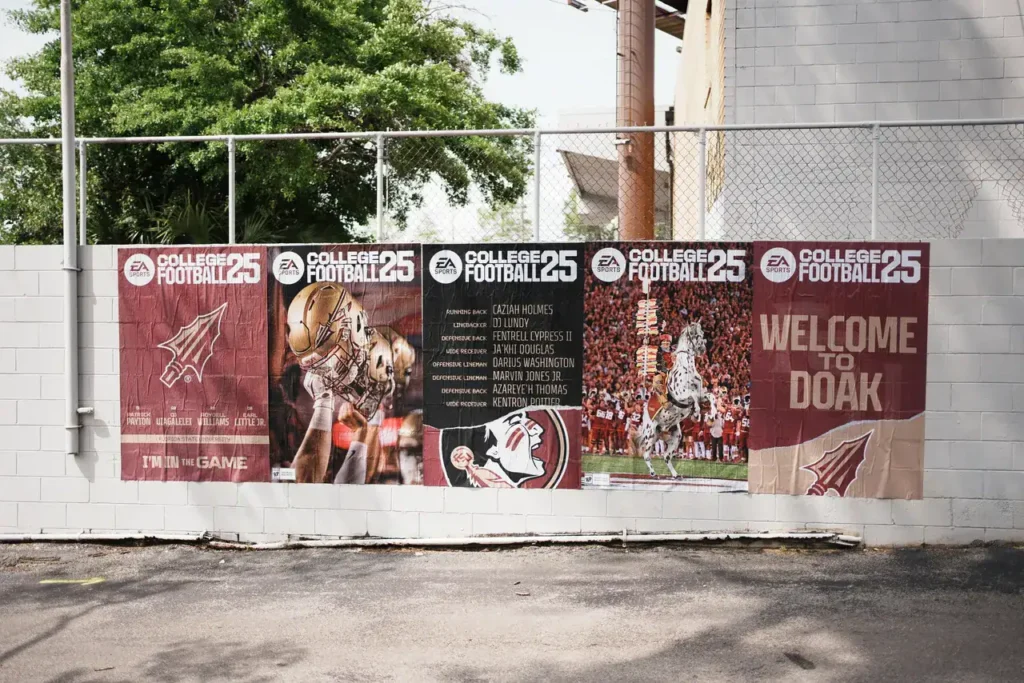 Banners promoting College Football 25 featuring Florida State University team imagery and welcome message, highlighting guerrilla marketing strategies in sports advertising.