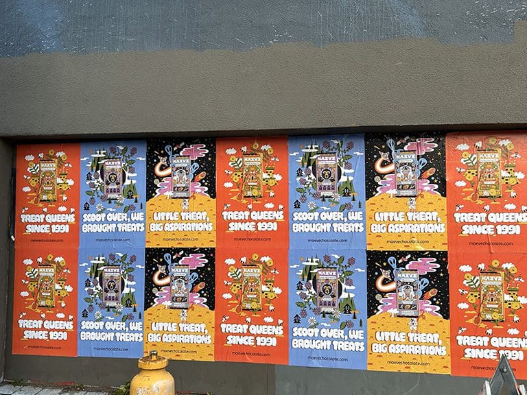 Colorful guerrilla marketing posters showcasing treats with slogans like "Treat Queens Since 1991" and "Little Treat, Big Aspirations," promoting local advertising strategies.