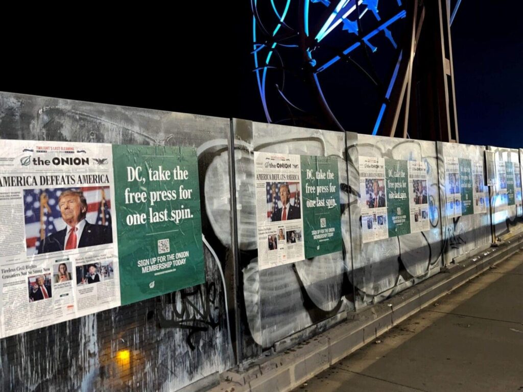 The Onion wild wheatpaste posters by American Guerrilla Marketing on city walls as part of a bold outdoor media campaign.