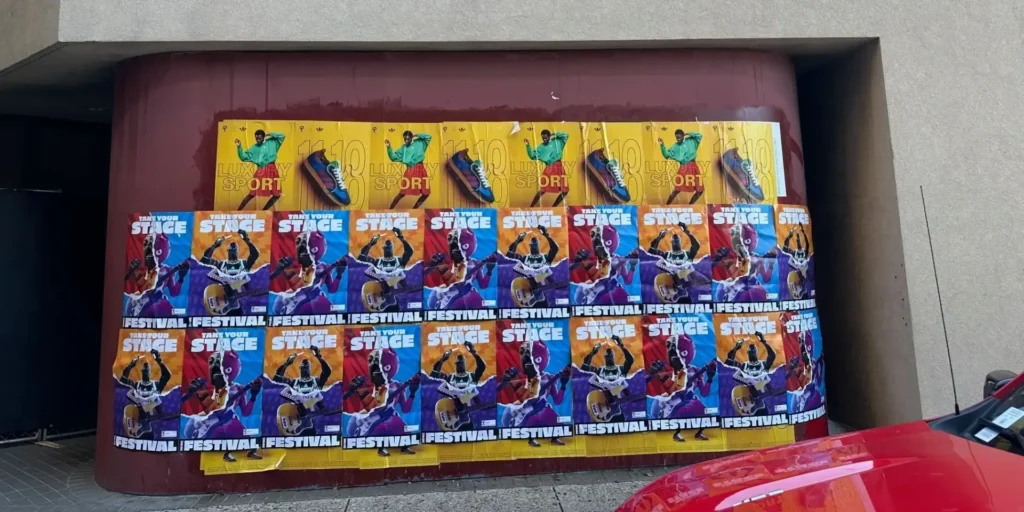 Wild wheatpaste posting ads on urban walls in Arizona