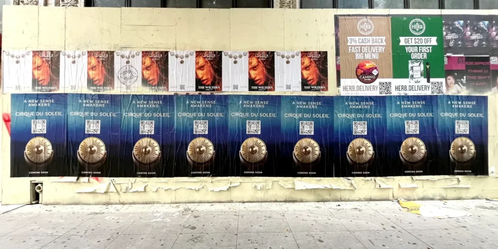 Wild Wheat Paste Posting Campaign for Cirque Du Soleil by American Guerrilla Marketing showcasing vivid posters in high-traffic city areas.