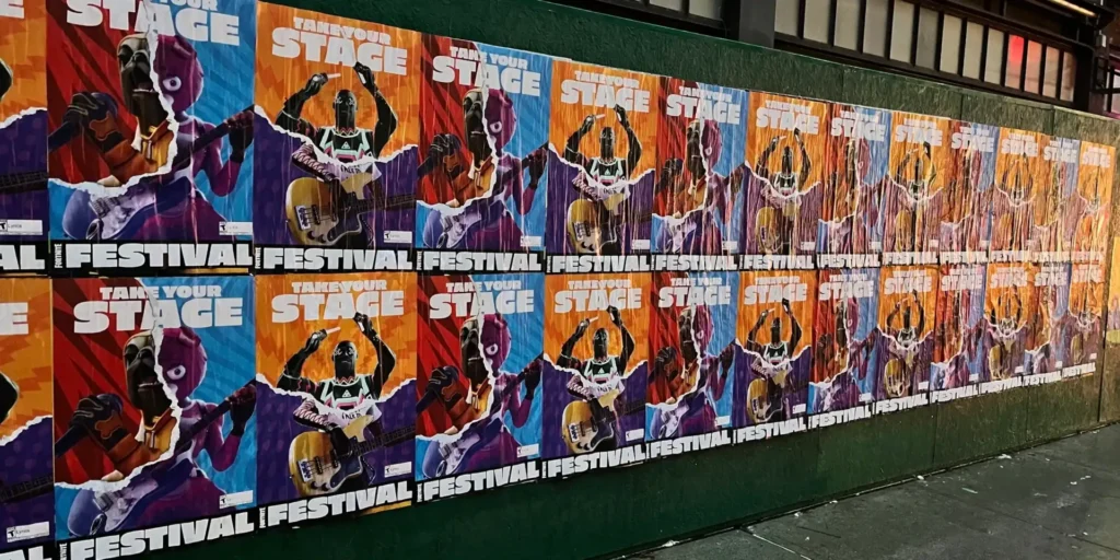Wild Wheat Paste Posting Campaign for Fortnite by American Guerrilla Marketing featuring vibrant posters in high-traffic urban areas.