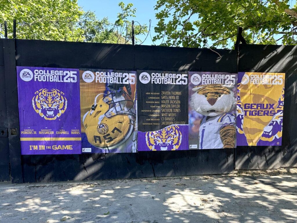Posters promoting EA College Football 25 featuring LSU Tigers mascot, player images, and team branding, highlighting guerrilla marketing at Louisiana State University.