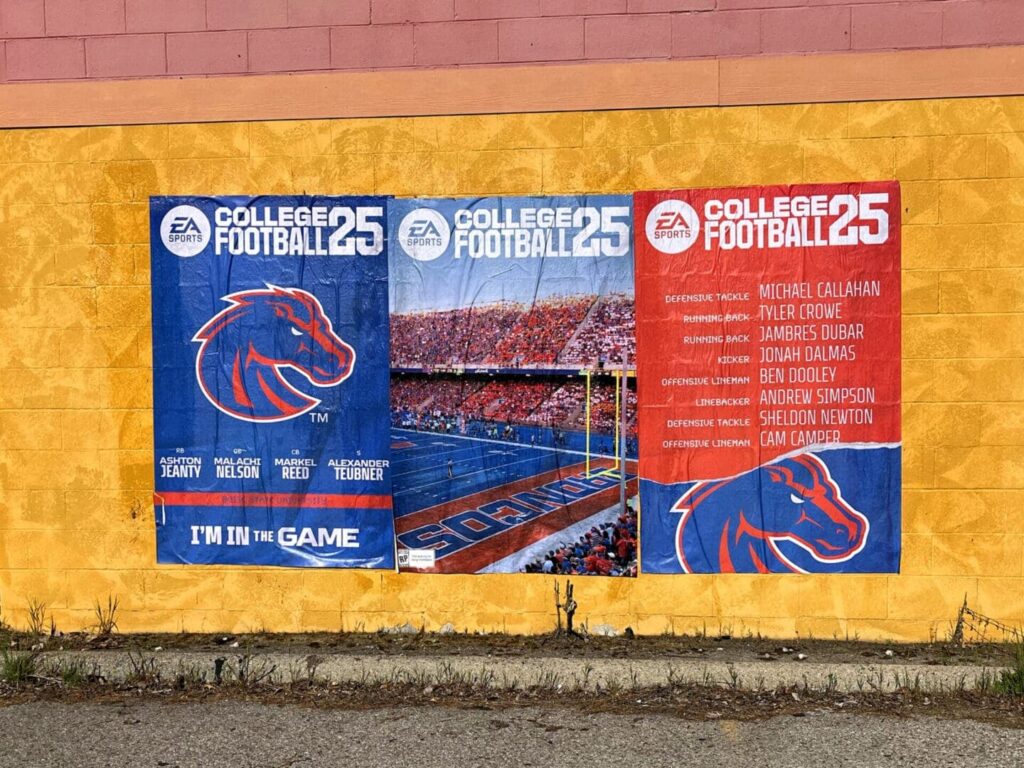 Mural promoting EA Sports College Football 25 featuring Boise State logo, stadium scene, and player names, highlighting innovative guerrilla marketing strategies.