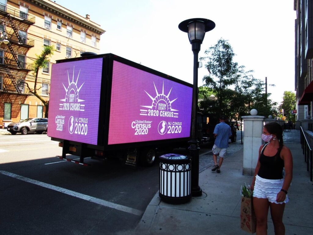 Truck displaying 2020 Census digital advertisement.