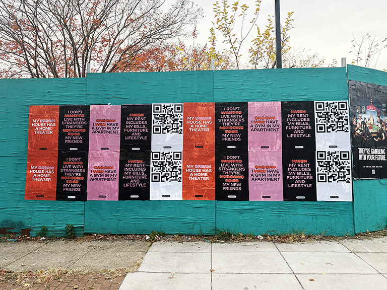 Colorful wheatpaste posters on urban wall promoting lifestyle messages and QR codes for engagement in Nebraska's guerrilla marketing campaigns.