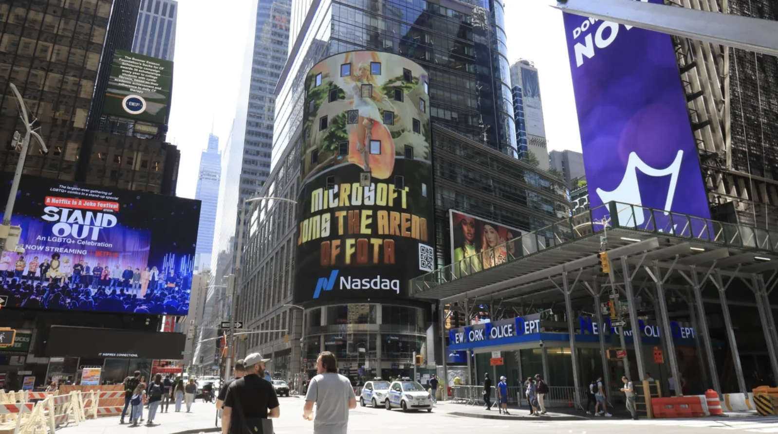 Billboard advertisement in Times Square featuring Microsoft and FOTA, showcasing digital marketing strategy and urban engagement.