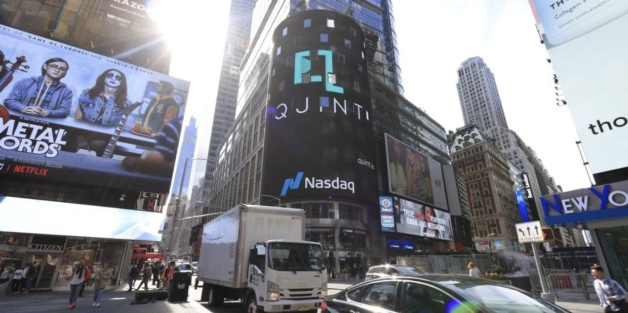 NASDAQ billboard in Times Square featuring advertising for Quint, showcasing the iconic location and potential for high-visibility marketing.