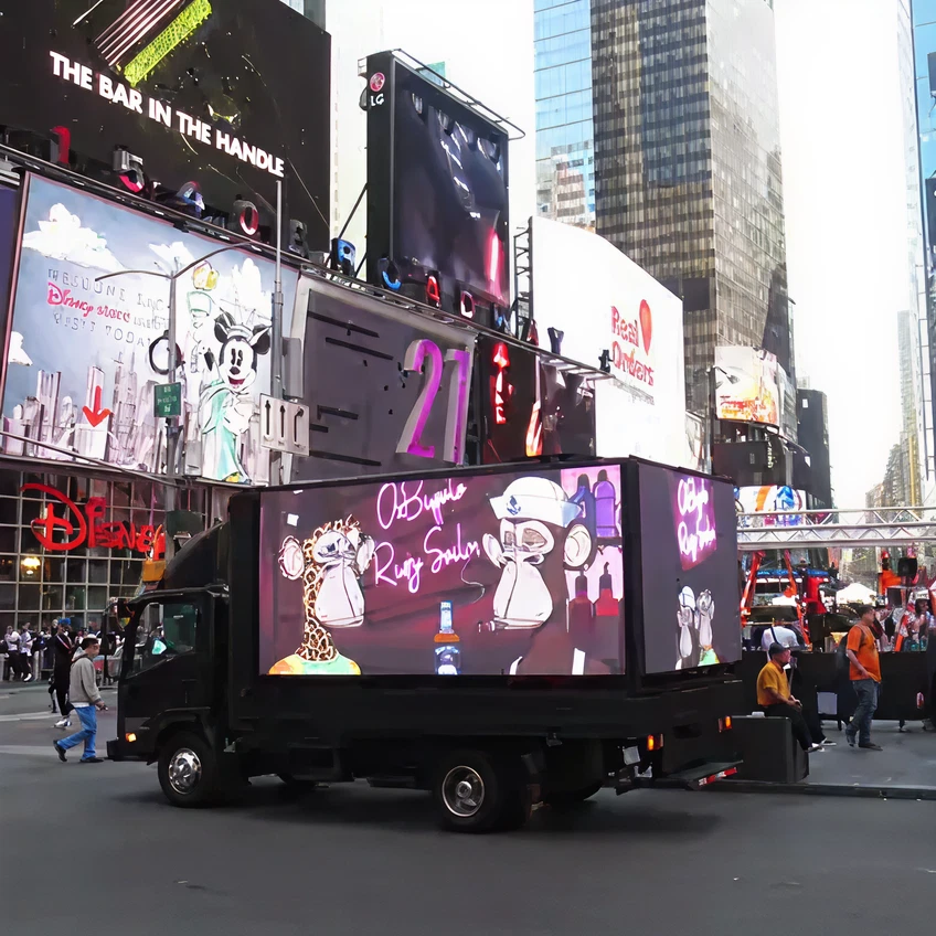 LED billboard truck displaying vibrant animated characters in Times Square, showcasing guerrilla marketing strategies for impactful brand promotion.