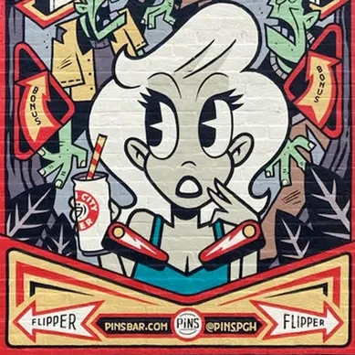 Street mural featuring a stylized woman with a drink, surrounded by playful graphics and text, representing innovative guerrilla marketing techniques by American Guerrilla Marketing.