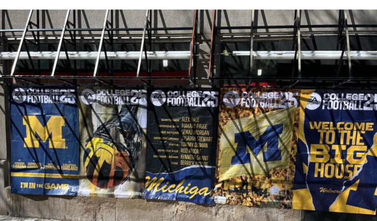 Banners promoting EA Sports College Football 25 featuring team logos, player names, and slogans, displayed prominently in a campus setting, illustrating the guerrilla marketing campaign's cultural integration among students.
