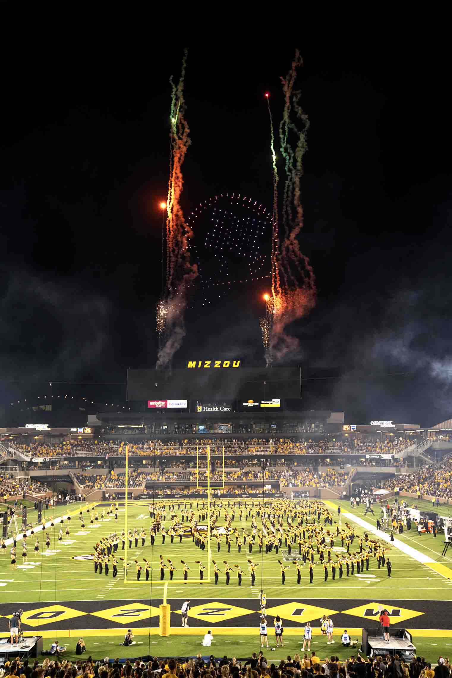 Mizzou Drone Show at Faurot Field featuring synchronized fireworks, 300 LED-equipped drones, and Marching Mizzou performance, showcasing large-scale sports activation and audience engagement during the 2024 season opener.
