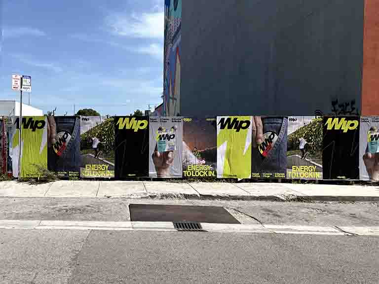 Billboard advertisements featuring vibrant graphics and slogans promoting "Energy to Lock In" for a beverage brand, showcasing guerrilla marketing strategies by American Guerrilla Marketing.