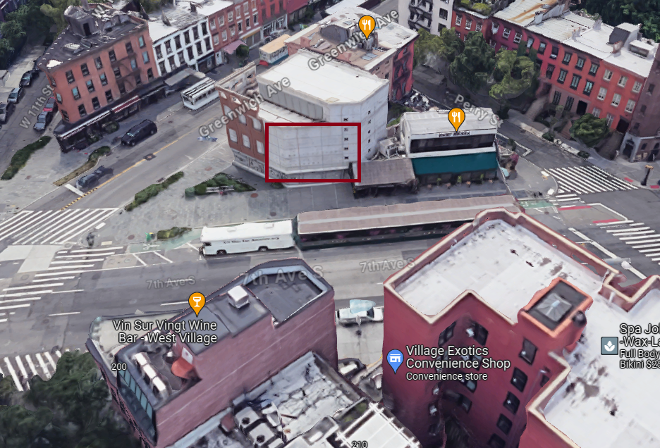 Aerial view of 7th Avenue and Greenwich Street in New York City, featuring a blank wall space ideal for guerrilla projection advertising campaigns by American Guerrilla Marketing.