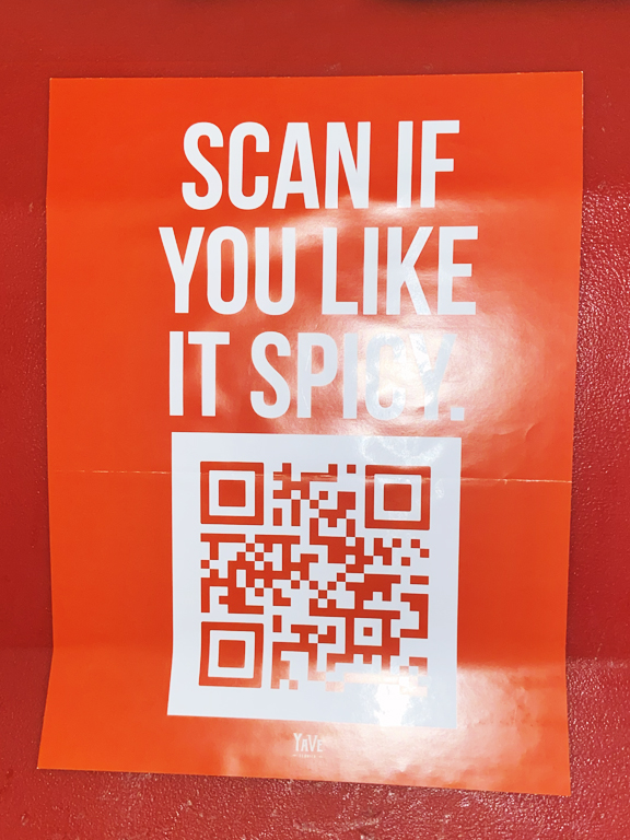 Orange promotional poster for Yav&eacute; Tequila with text "SCAN IF YOU LIKE IT SPICY" and a QR code, emphasizing engagement for a Snipe Posting Activation in Dallas, Texas.