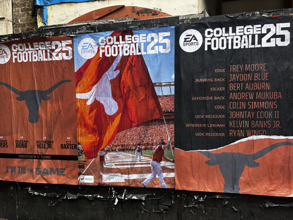 EA Sports College Football 25 promotional wheatpaste campaign featuring Texas Longhorns imagery and player names, showcasing guerrilla marketing strategy in urban setting.