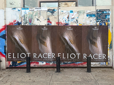 Posters featuring "Eliot Racer" displayed prominently on a wall, surrounded by colorful graffiti, illustrating urban advertising and brand visibility in a dynamic environment.