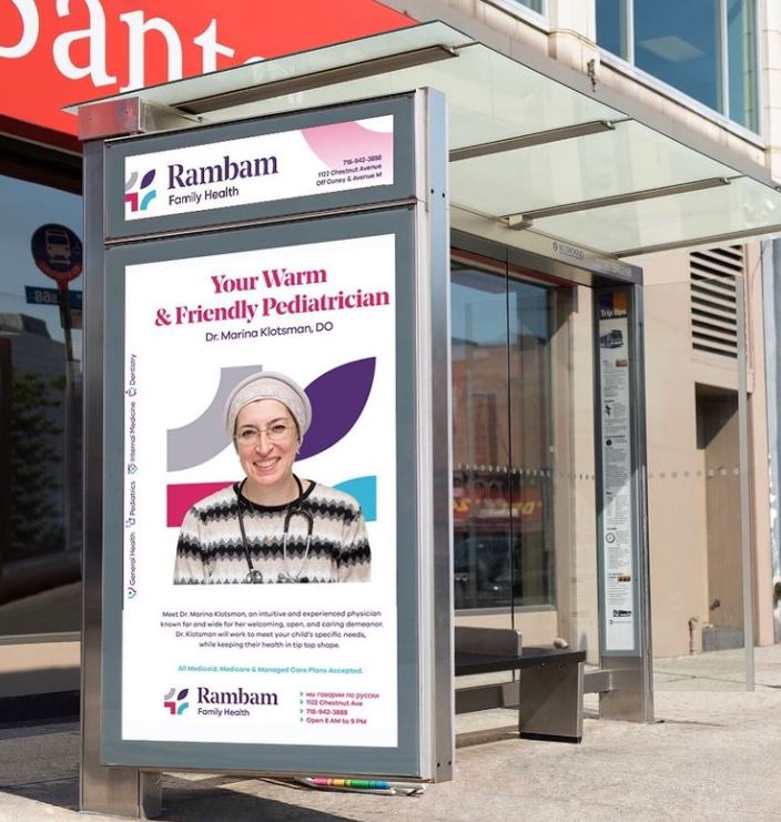 Bus-stop advertising for Rambam Family Health featuring Dr. Marina Klotsman, pediatrician, with a friendly portrait and promotional text highlighting pediatric services.