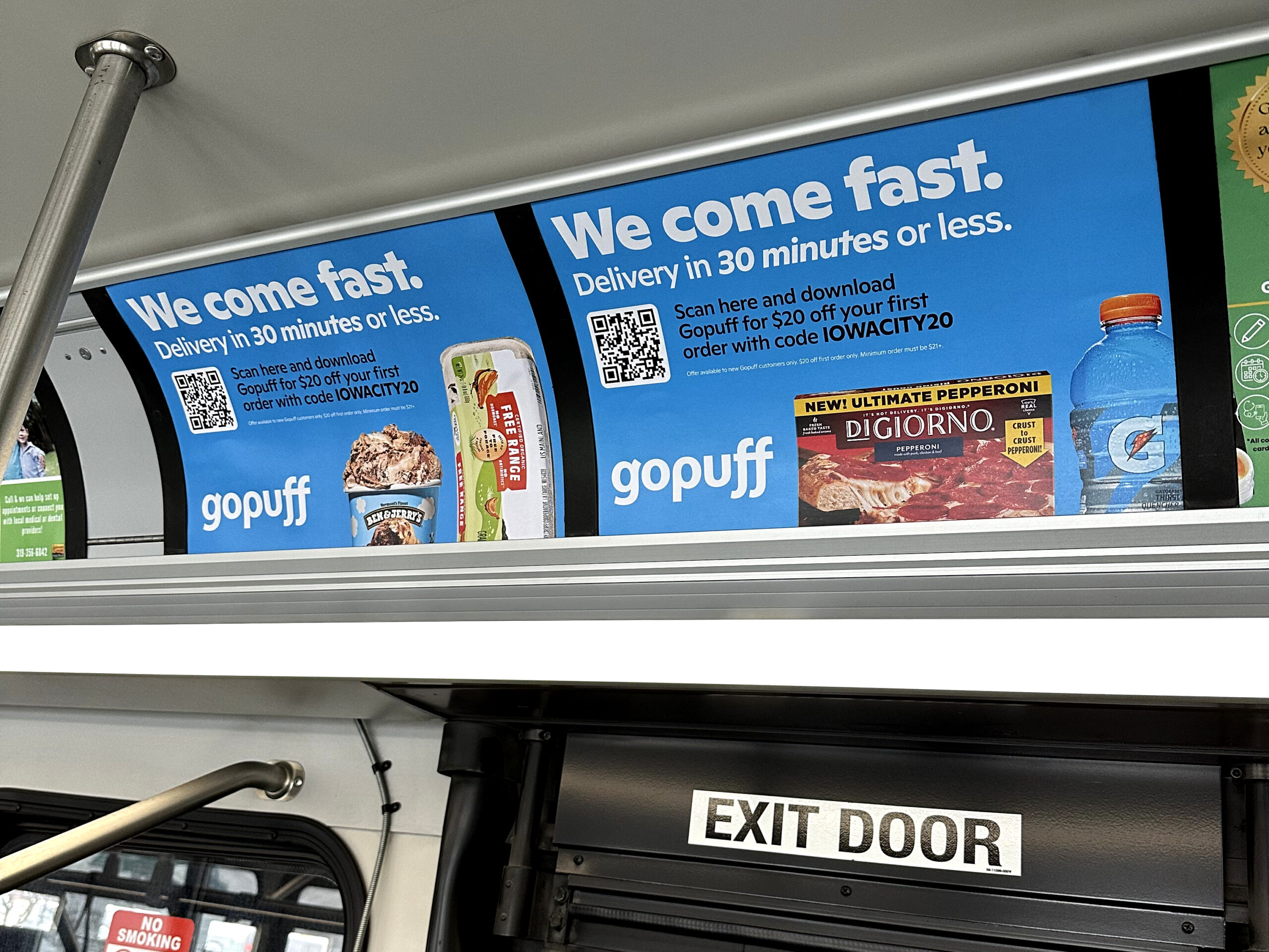 Interior bus advertisement for Gopuff, featuring promotional messaging about fast delivery in 30 minutes or less, QR code for app download, and images of ice cream, snacks, and beverages.